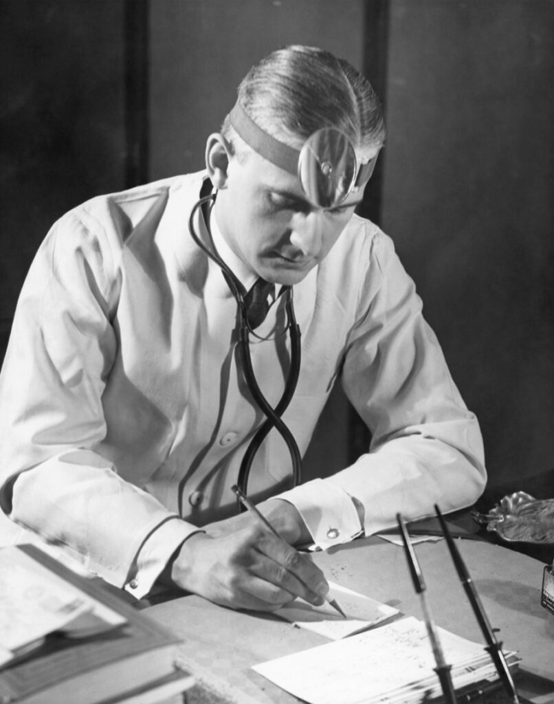 Doctor writing notes.