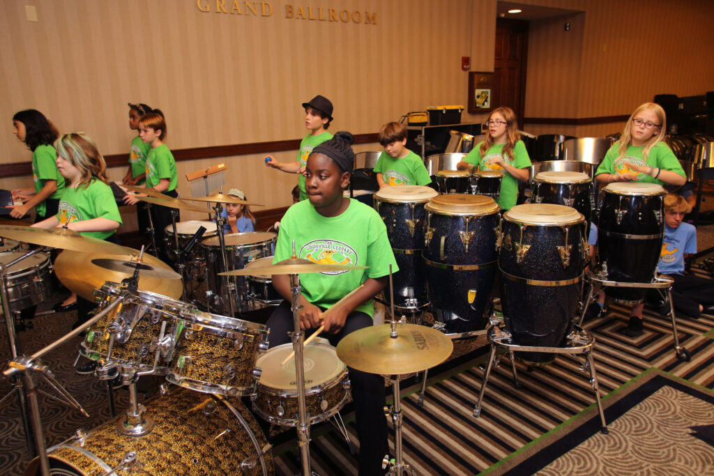 Louisville Leopards Kids playing drums.